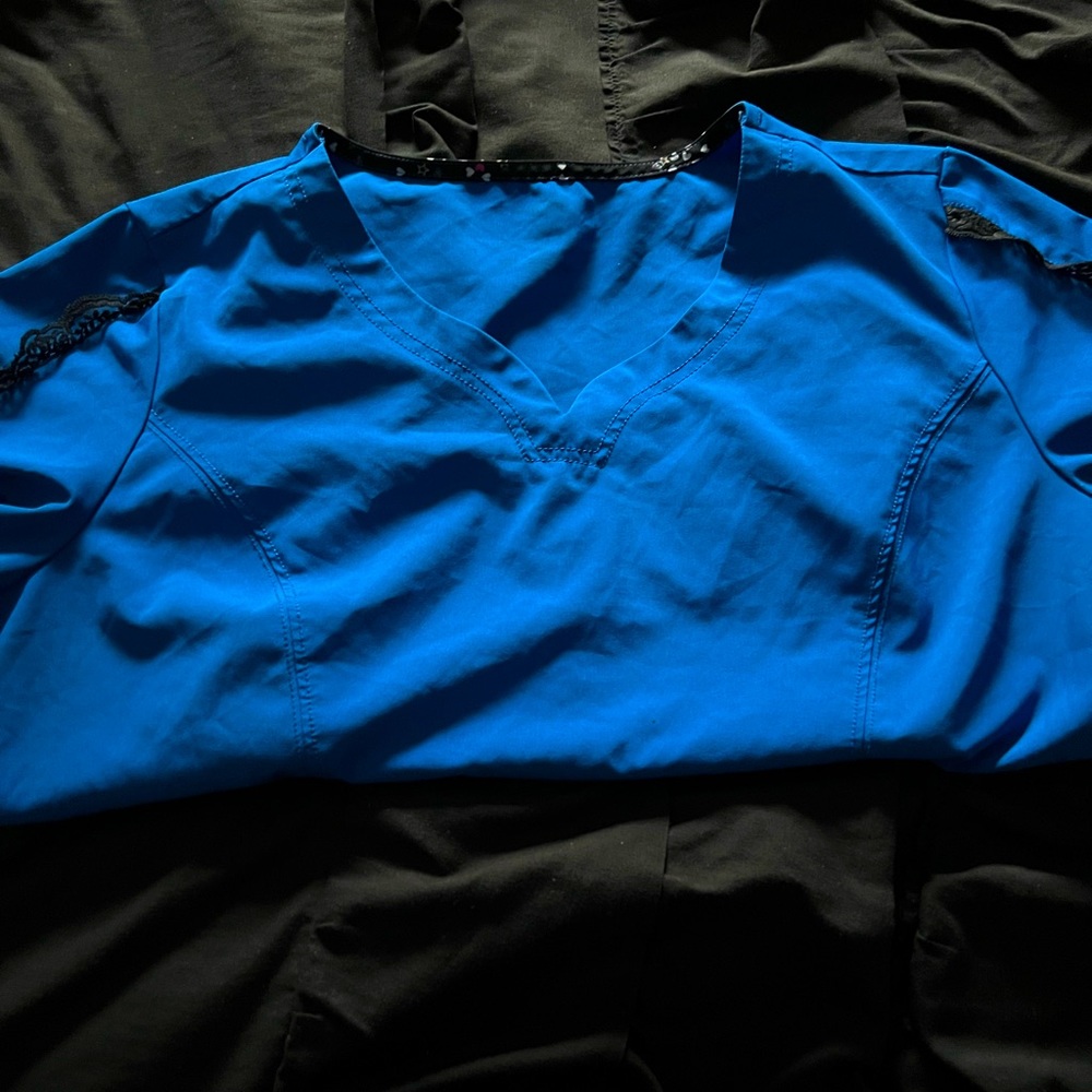 Large peplum  Heartsoul Lace trimmed scrub top.